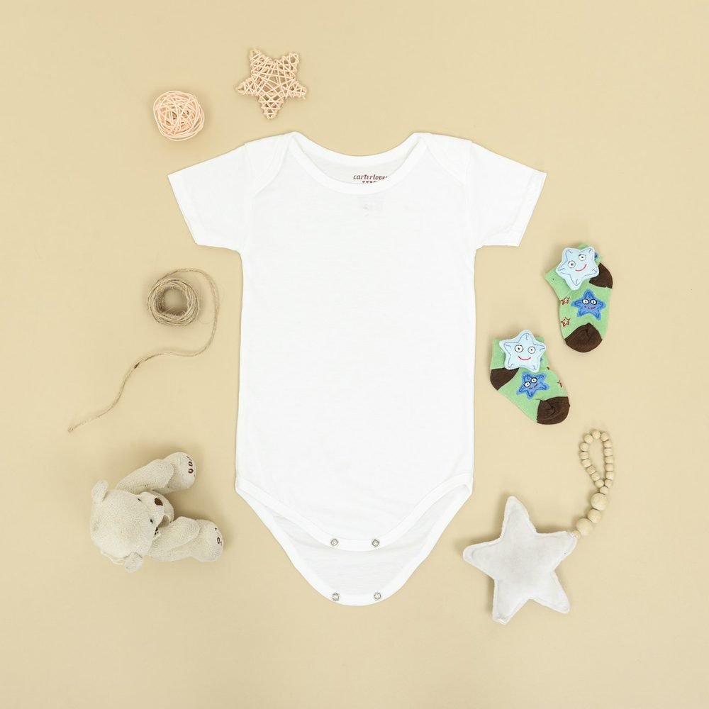 Organic cotton baby onesie flat-lay