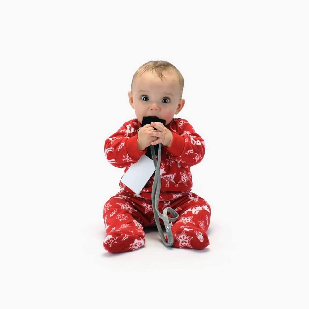 Baby wearing a printed cotton romper